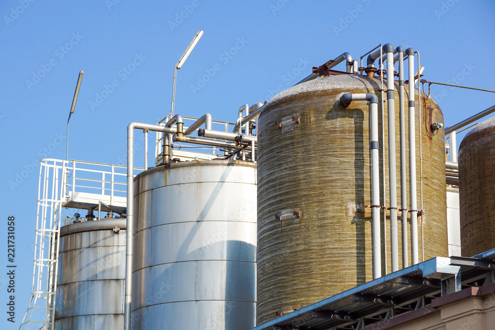 Stainless storage tanks in chemical industry . .metal detail
