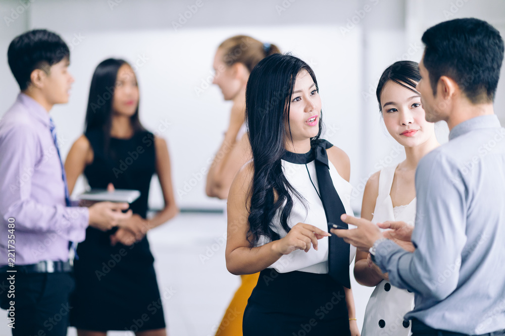 Team people conversation in seminar conference room.Business Group discussing analyzing and planning strategy business Team people conversation in seminar conference room.Business Group discussing analyzing and planning strategy business