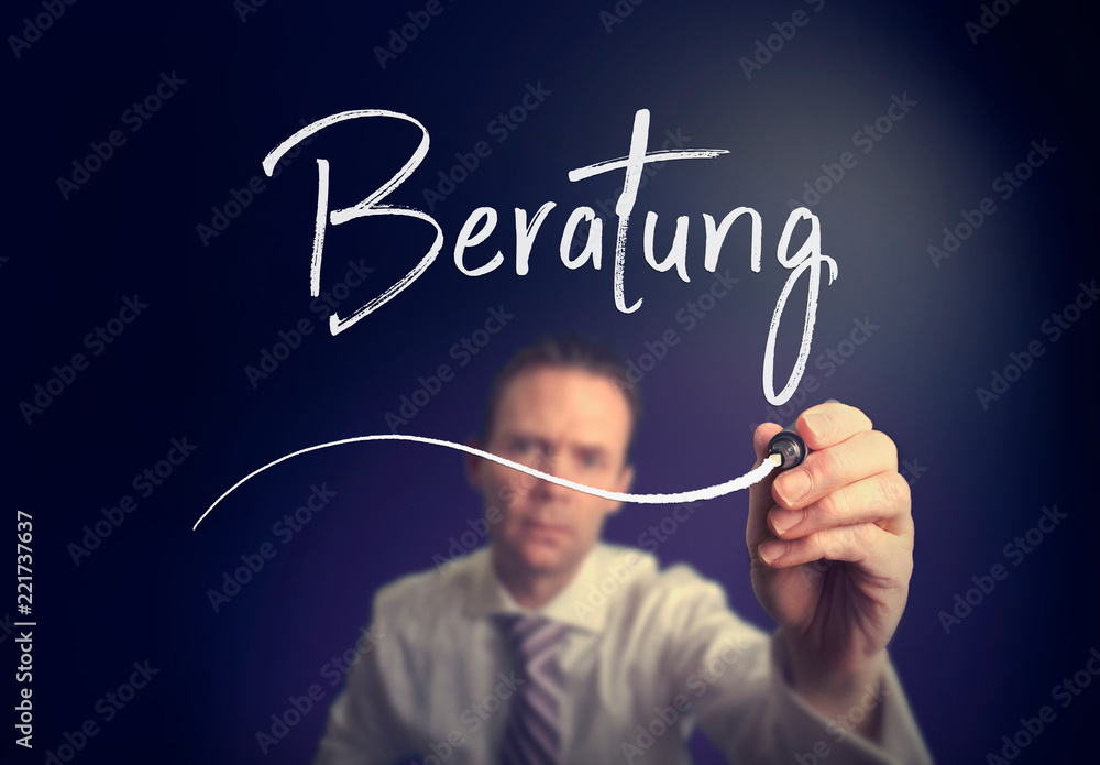 A businessman writing a Consultation A businessman writing a Consultation