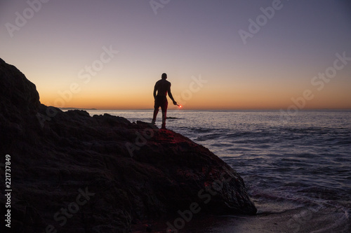 Man exercising at the beach © Attila Adam