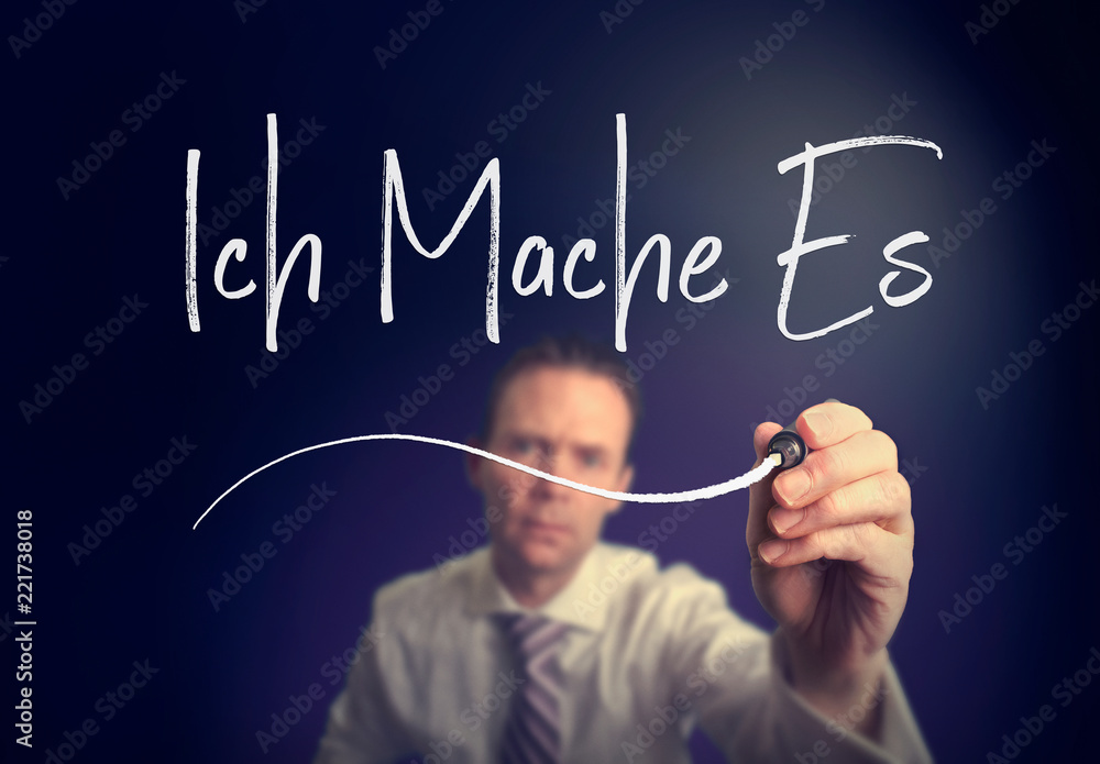 A businessman writing a I Do It A businessman writing a I Do It