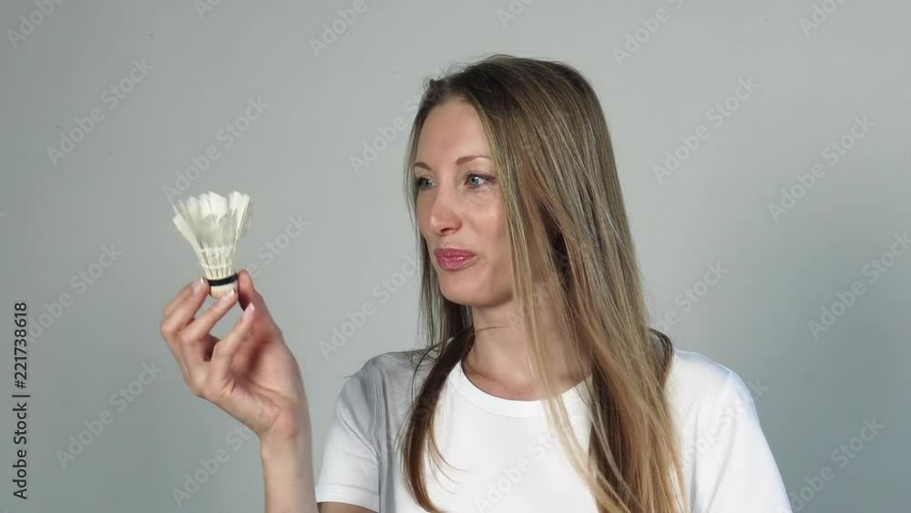 Blond woman Badminton Player Holding Shuttlecock Blond woman Badminton Player Holding Shuttlecock