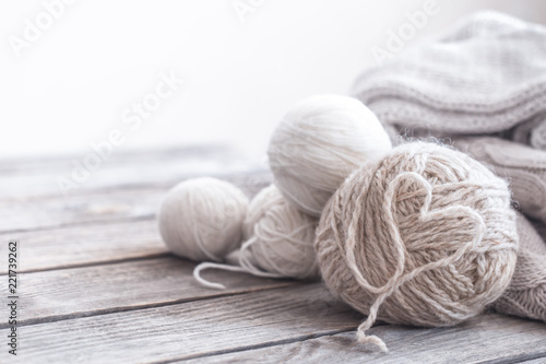 home hobbies, knitting threads a wooden background