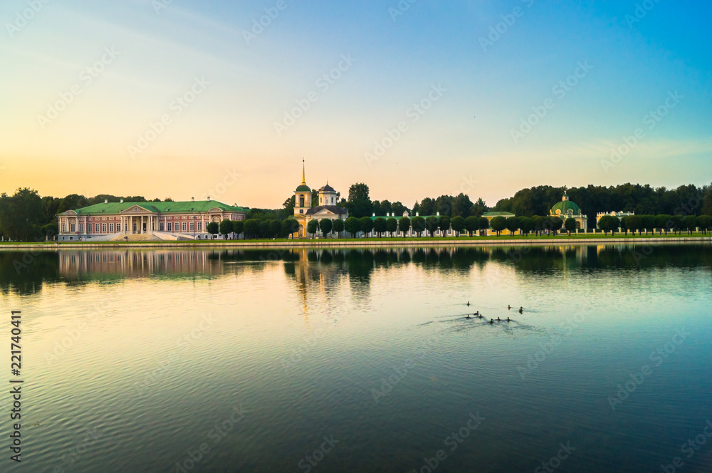 Evening serenity of the palace pond, included into ensemble of the State reserve museum Kuskovo, former aristocratic summer country estate of the russian nobility of the 18th century. Moscow. Russia.