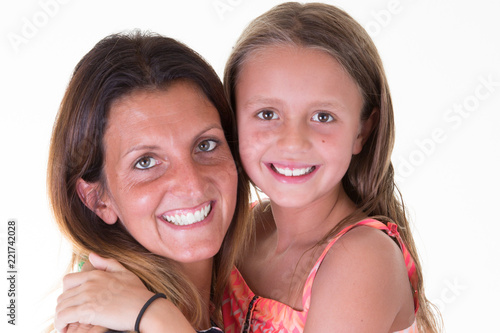 Close up portrait of happy white mother and young daughter pretty cute girls family