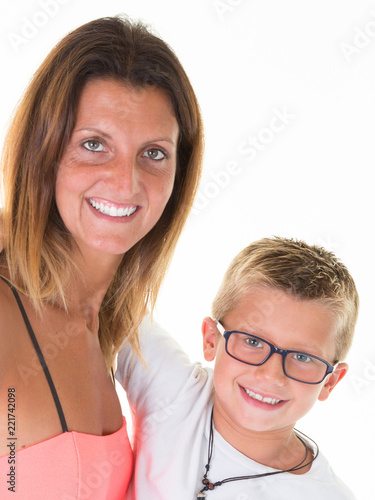 Happy beauty mother and son with glasses isolated on white background