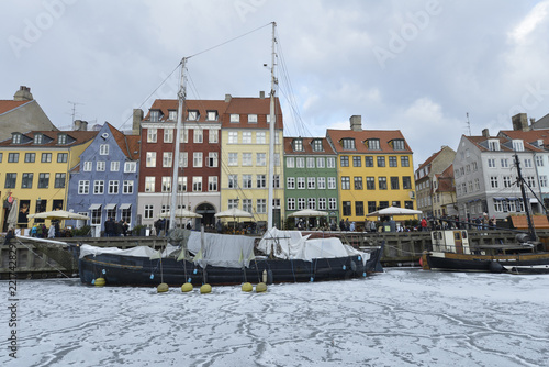 Wall Mural Colored facades of Nyhavn in Copenhagen in Denmark in winter