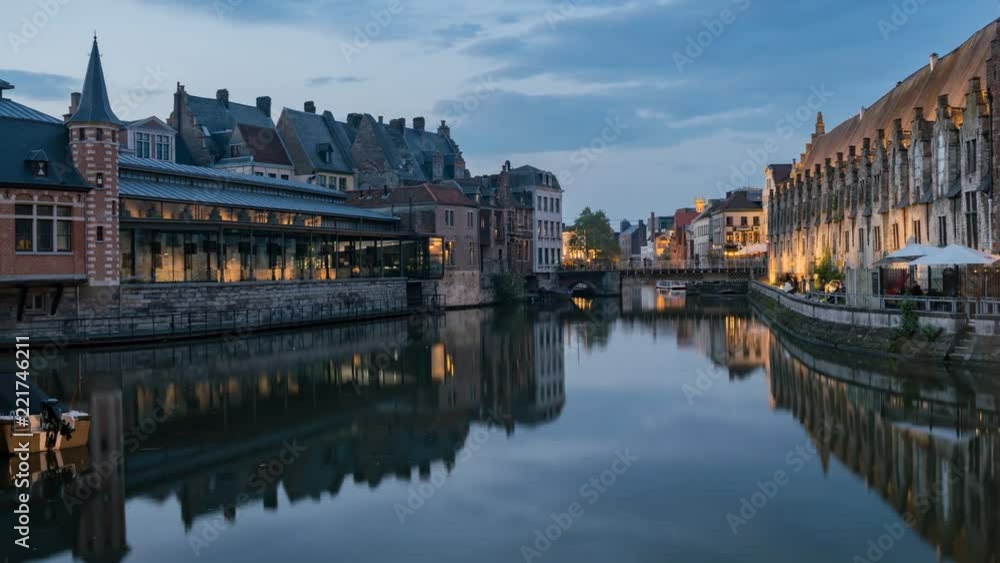 Pan motion timelapse video of the beautiful cityscape and Leie river from afternoon to sunset at Ghent, Belgium Pan motion timelapse video of the beautiful cityscape and Leie river from afternoon to sunset at Ghent, Belgium