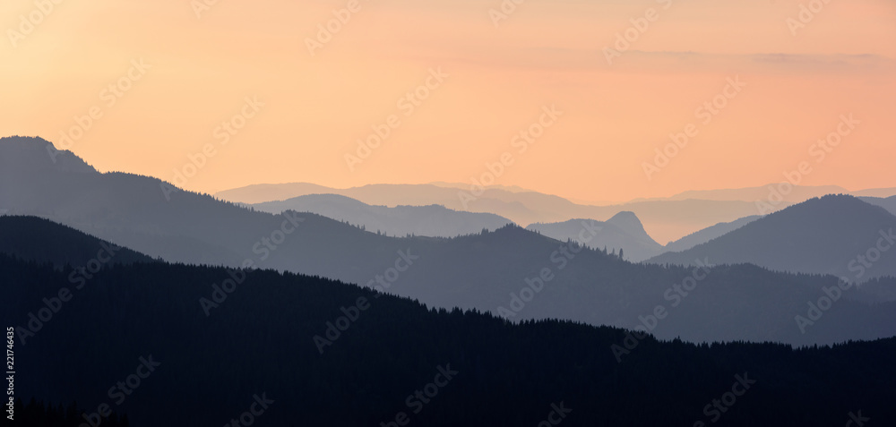 Foggy Sunrise in the Mountains. Mountain panoramic landscape. 
