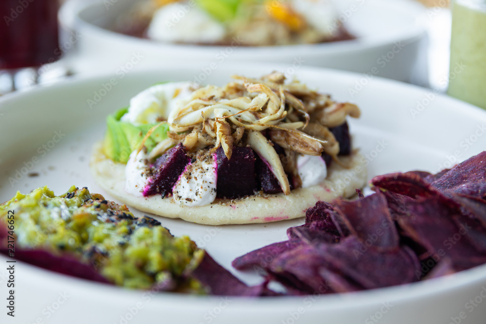 Tortilla with avocado, fresh cheese, beetroot and oyster mushrooms Tortilla with avocado, fresh cheese, beetroot and oyster mushrooms