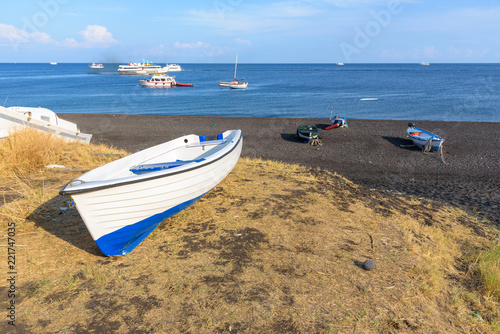 Boat on the black beach on Stromboli Island