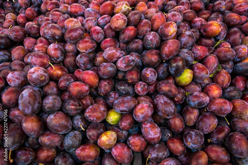 background in the form of a mountain plum on the store counter