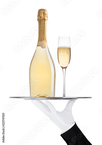 Hand with glove holds tray with champagne bottle © DenisMArt