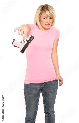 Blonde Woman Afraid of Handgun