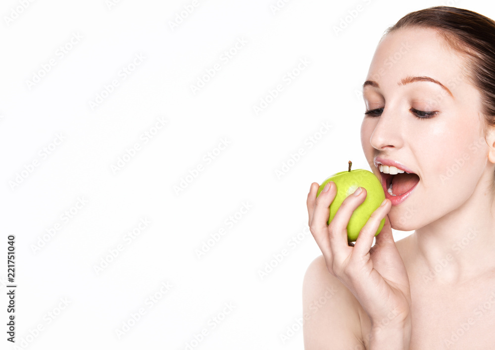 Beautiful fitness woman eating healthy apple Beautiful fitness woman eating healthy apple