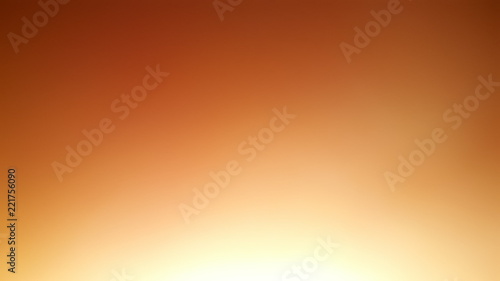 Smooth orange background with illuminations in the lower part.