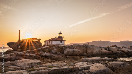 Tablou pe pânză Lighthouse on the island of Arousa at sunset in Galicia, Spain