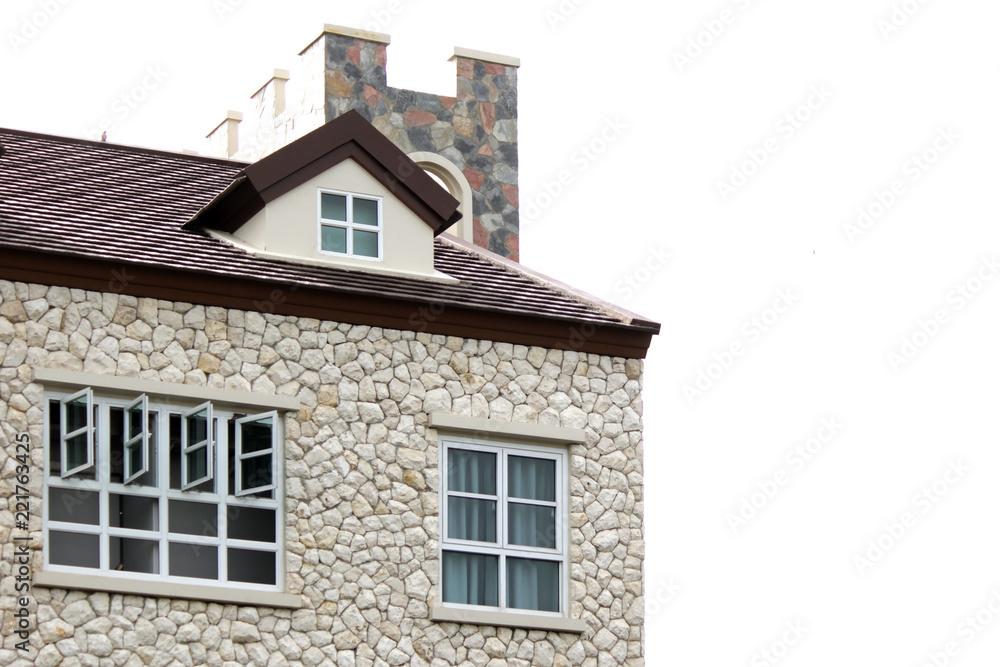 windows and gable roof on stone house