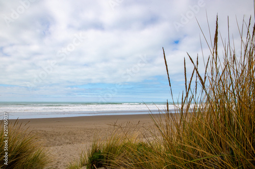 A calm beach view on a cloudy day along the east coast in New Zealand