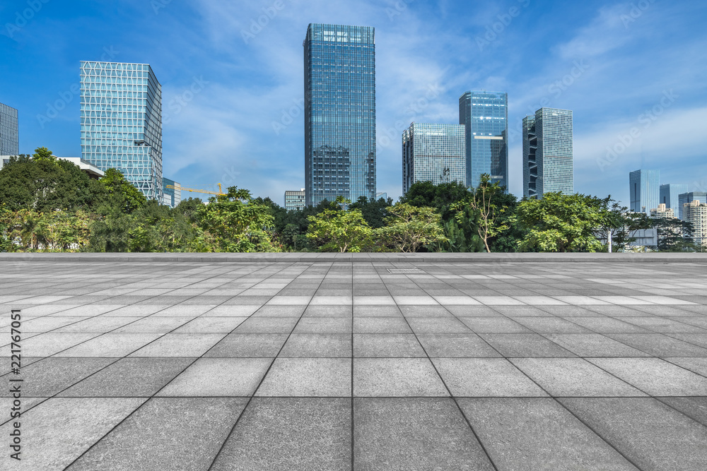 Panoramic skyline and buildings with empty square floor.