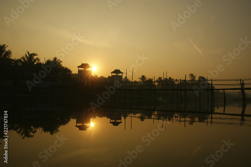 old rural wooden bridge at dawn. a wooden bridge is located near the old Portuguese fort in Goa. India