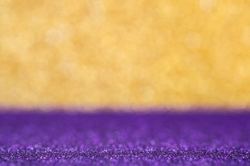 Abstract gold and luxry purple sparkling bokeh wall and floor background studio.luxury holiday backdrop mock up for display of product.holiday festive greeting card.