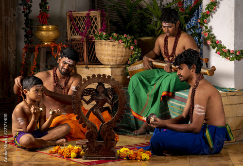 Young Hindu men invoke Lord Shiva