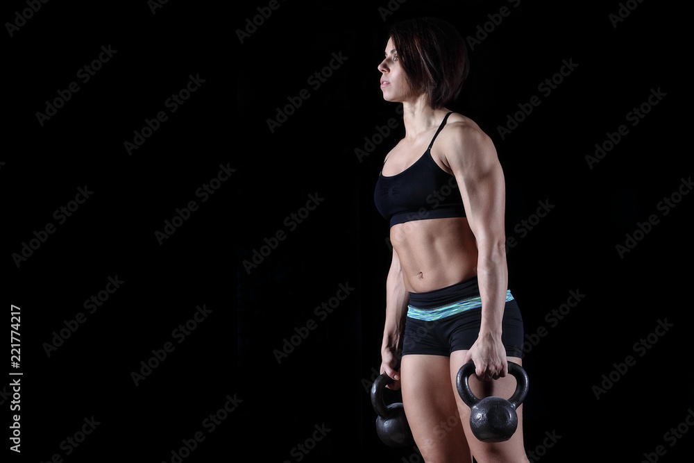 young muscular sports girl engaged with weight young muscular sports girl engaged with weight