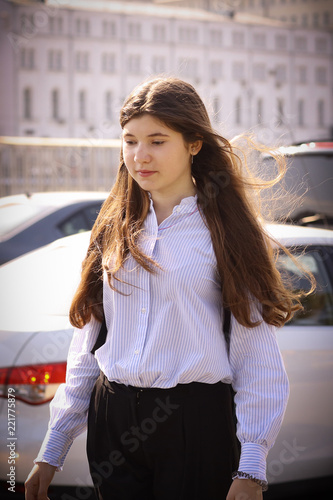 beautiful teenager girl with long brown hair close up photo photo