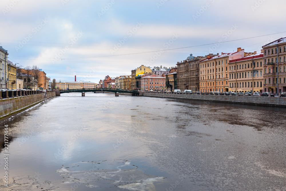 Fototapeta premium Embankment of Fontanka River and Krasnoarmeysky bridge in Saint Petersburg, Russia