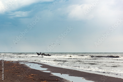 Fototapeta Naklejka Na Ścianę i Meble -  Fishermens on a boat in the sea