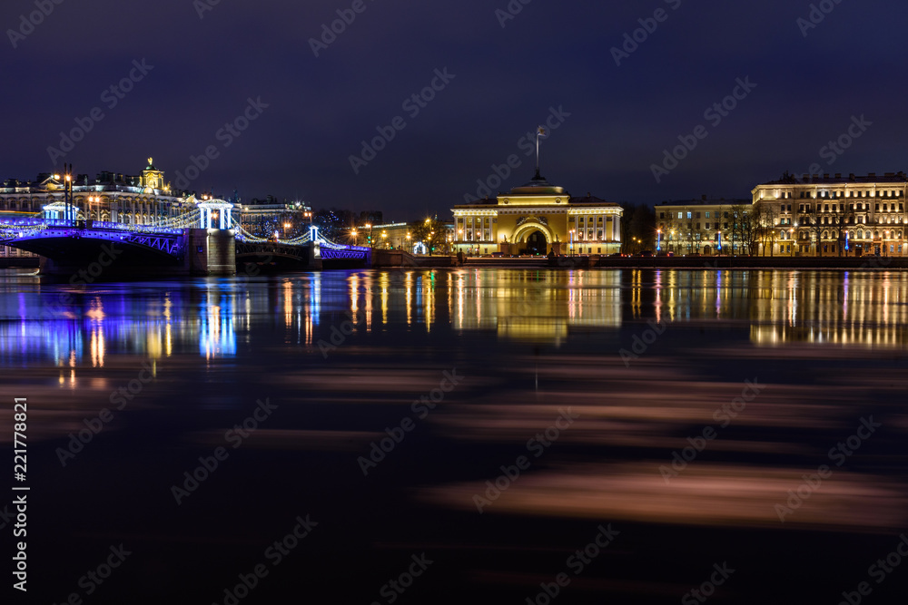 View of Palace Bridge and Admiralty embankment at night. Saint Petersburg. Russia