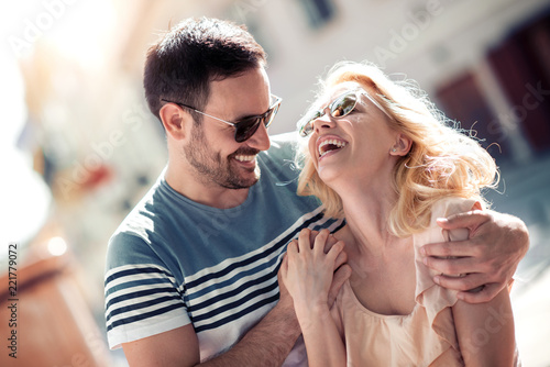Portrait of beautiful young couple outside