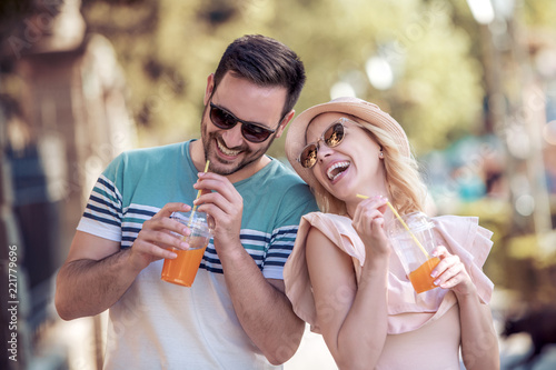 Young couple drinking healthy juice
