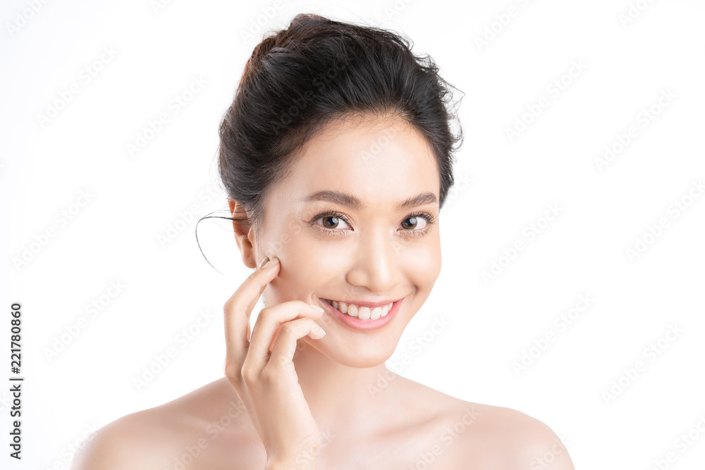 Beautiful woman asian face close up studio .She is holding her cheeks. Beautiful woman asian face close up studio .She is holding her cheeks.