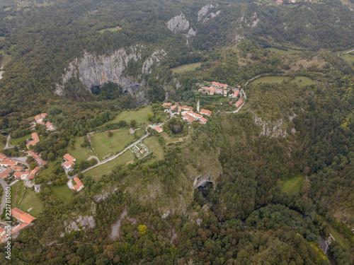 The Skocjan Caves / Skocjanske jame / Grotte di Skocjan is the largest cave in Europe on UNESCO list. The enterance is a huge collapse sinhole / doline below the church of St. Canzian (Kancijan) 