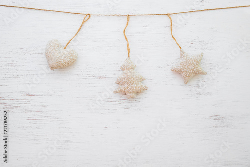 Christmas background - rustic christmas ornament hanging on white wood and copy space design.