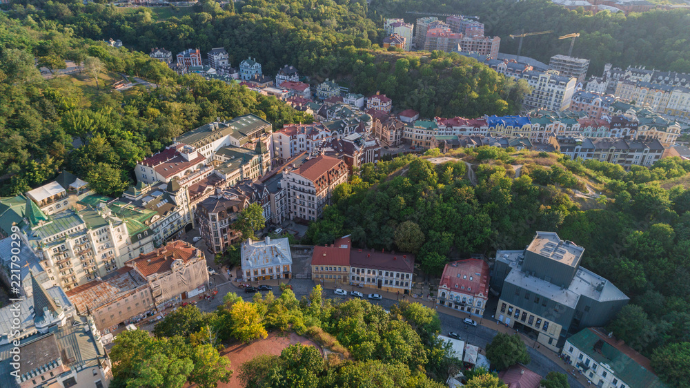 Aerial view of the roofs of buildings. Podol. Mountains. Trees. Kiev (Kyiv). Ukraine.
