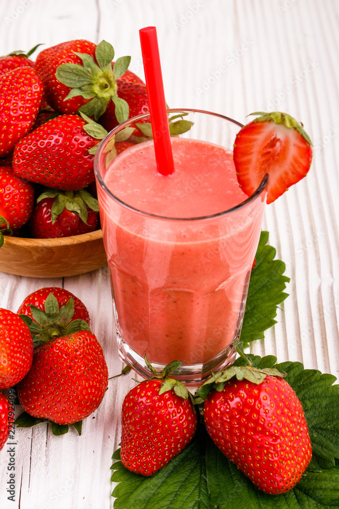 fresh strawberrysmoothie or milkshake on a wooden rustic background fresh strawberrysmoothie or milkshake on a wooden rustic background