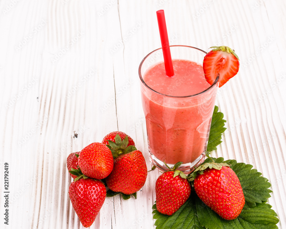 fresh strawberrysmoothie or milkshake on a wooden rustic background fresh strawberrysmoothie or milkshake on a wooden rustic background