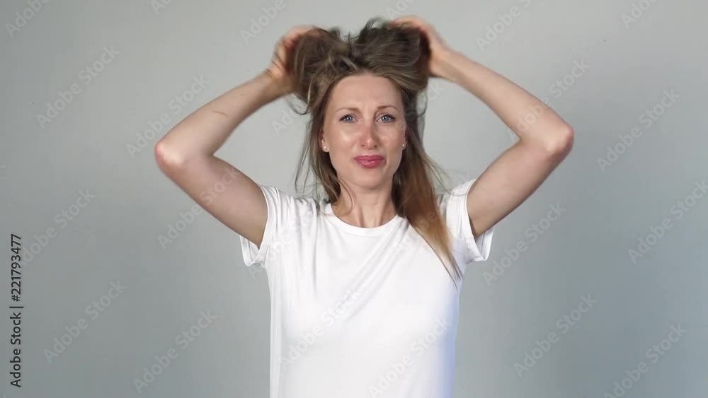 Pretty blond girl with negative emotion close up portrait Pretty blond girl with negative emotion close up portrait