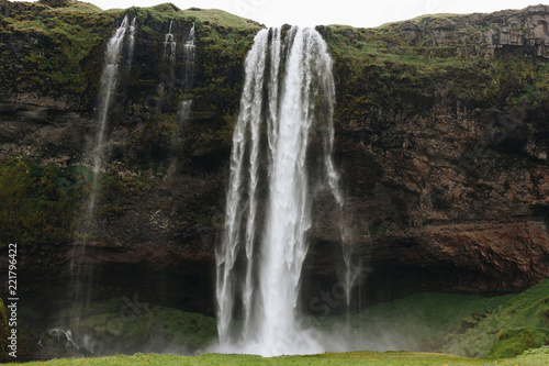 scenic view of beautiful Seljalandsfoss waterfall in highlands in Iceland