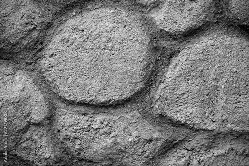 imitation of stone from cement, garden design on the wall