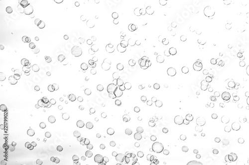 black bubbles on a white background