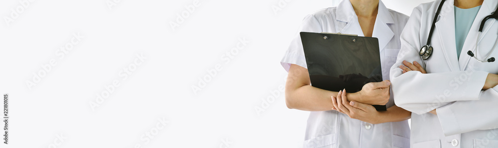 Doctor and nurse in uniform, Hospital background and Healthcare staff, Professional medical care provider with copy space for an advertising cover picture.