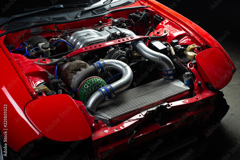 Car maintenance series: Red sport car engine bay - obrazy, fototapety, plakaty 