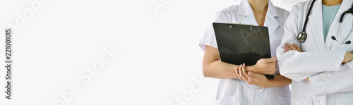 Obraz na płótnie Doctor and nurse in uniform, Hospital background and Healthcare staff, Professional medical care provider with copy space for an advertising cover picture. w salonie