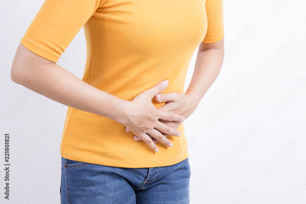 asian woman having stomachache on white background asian woman having stomachache on white background