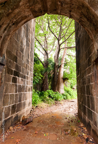 Stone arched entrance of Vasai fort photo