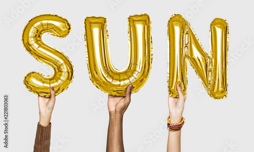 Hands showing sun balloons word